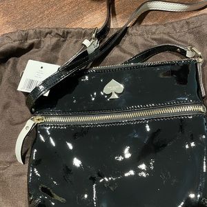 Brand new never used Kate Spade Tenley flicker black patent leather purse